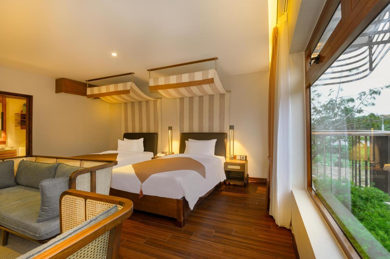 The Blossom Hoi An Ocean Front Hotel & Spa ภายนอก รูปภาพ