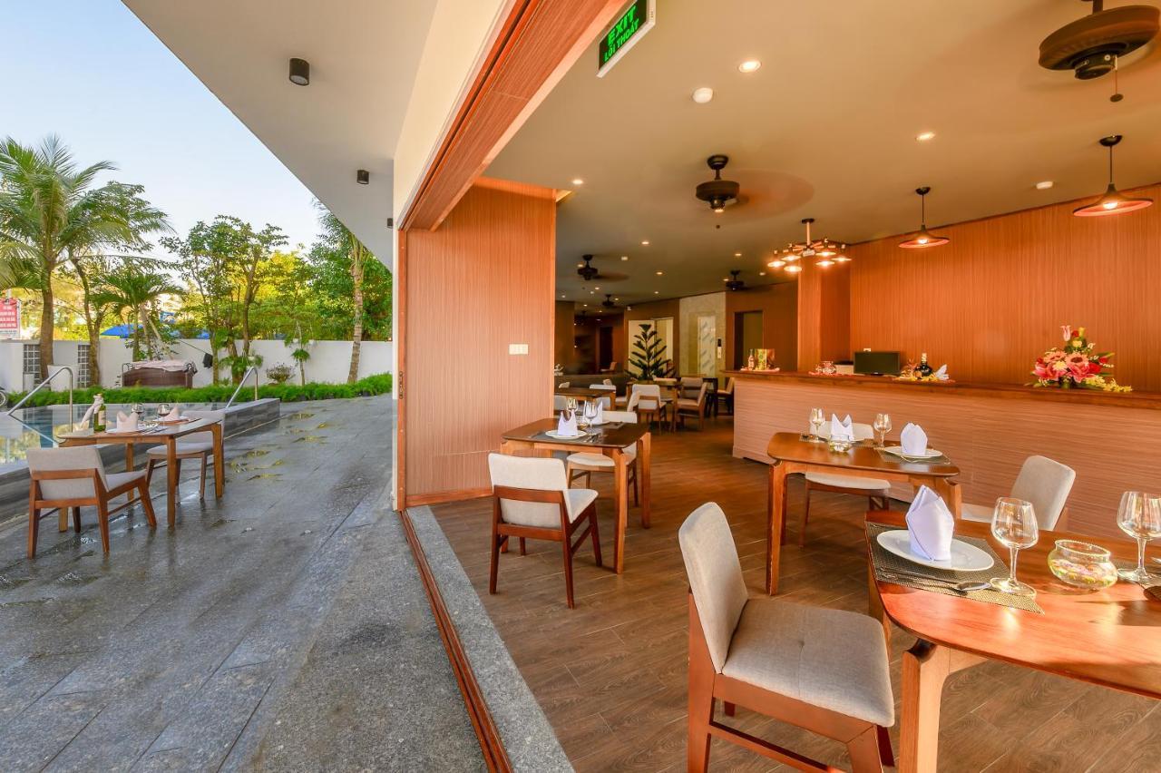 The Blossom Hoi An Ocean Front Hotel & Spa ภายนอก รูปภาพ