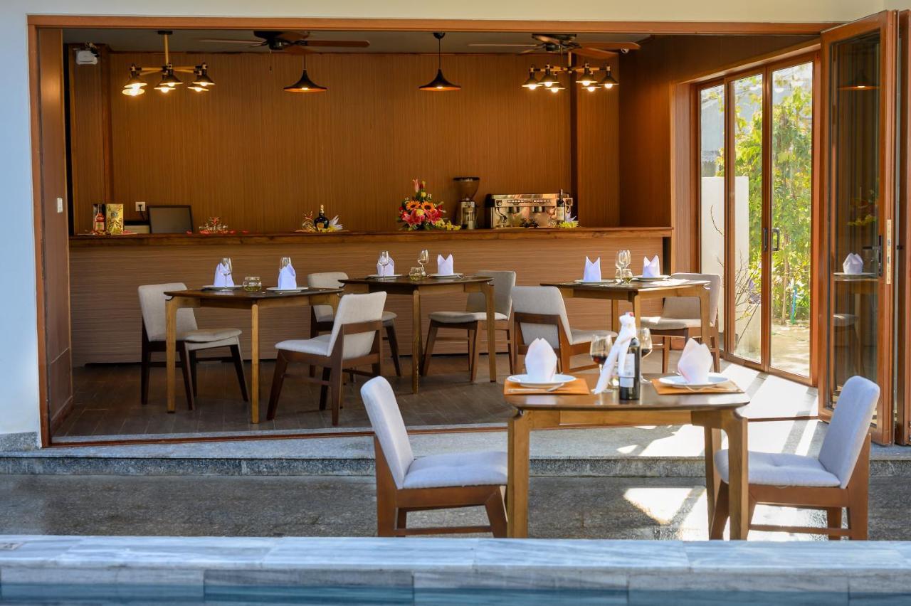 The Blossom Hoi An Ocean Front Hotel & Spa ภายนอก รูปภาพ